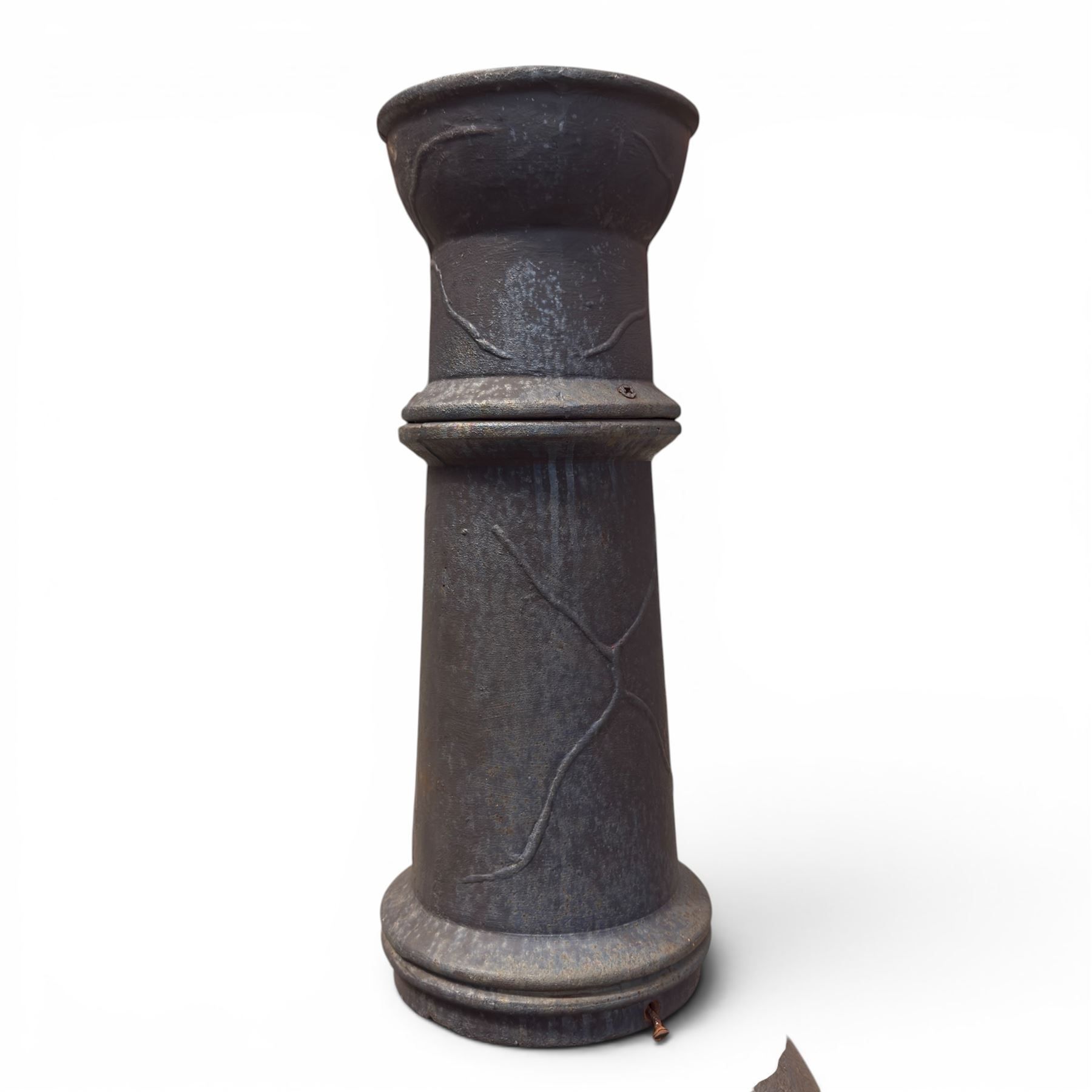 Cast iron garden chiminea, with mesh front spark guard, flue chimney on three splayed legs, finished in black.
