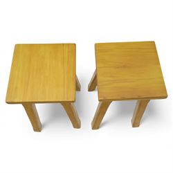 Late 20th century pine kitchen table and two stools, the rectangular drop-leaf table with straight legs, together with two square-topped stools 