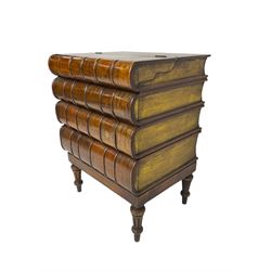 Writing desk in the form of four leather bound books, the hinged and sliding top with leather inset, fitted with three drawers, on turned and fluted supports