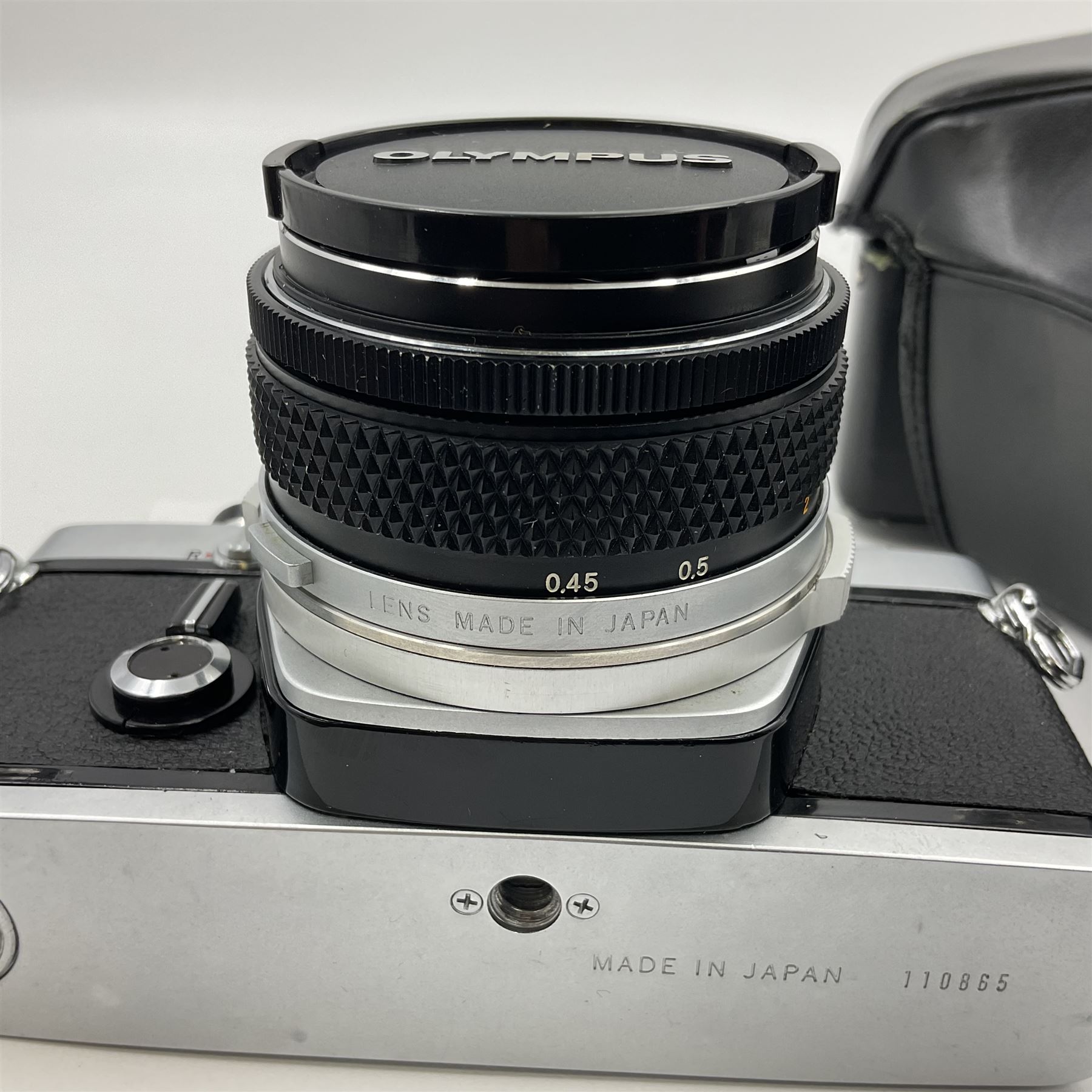 Olympus M-1 camera body, serial no. 110865, circa 1972, with ' Olympus M-System F.Zuiko Auto-S 1:1.8 f=50mm' lens, serial no. 105152, in leather case 