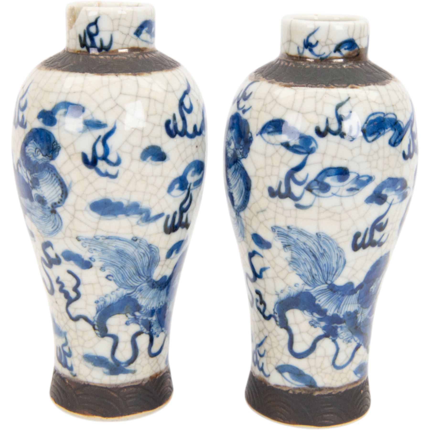Pair of 20th century Chinese crackle glaze vases, of baluster form, decorated with dogs of foo amongst clouds, H23cm