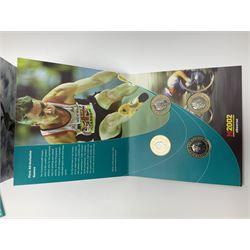 The Royal Mint Queen Elizabeth II 2002 Manchester Commonwealth Games four coin two pound coin  set in card display