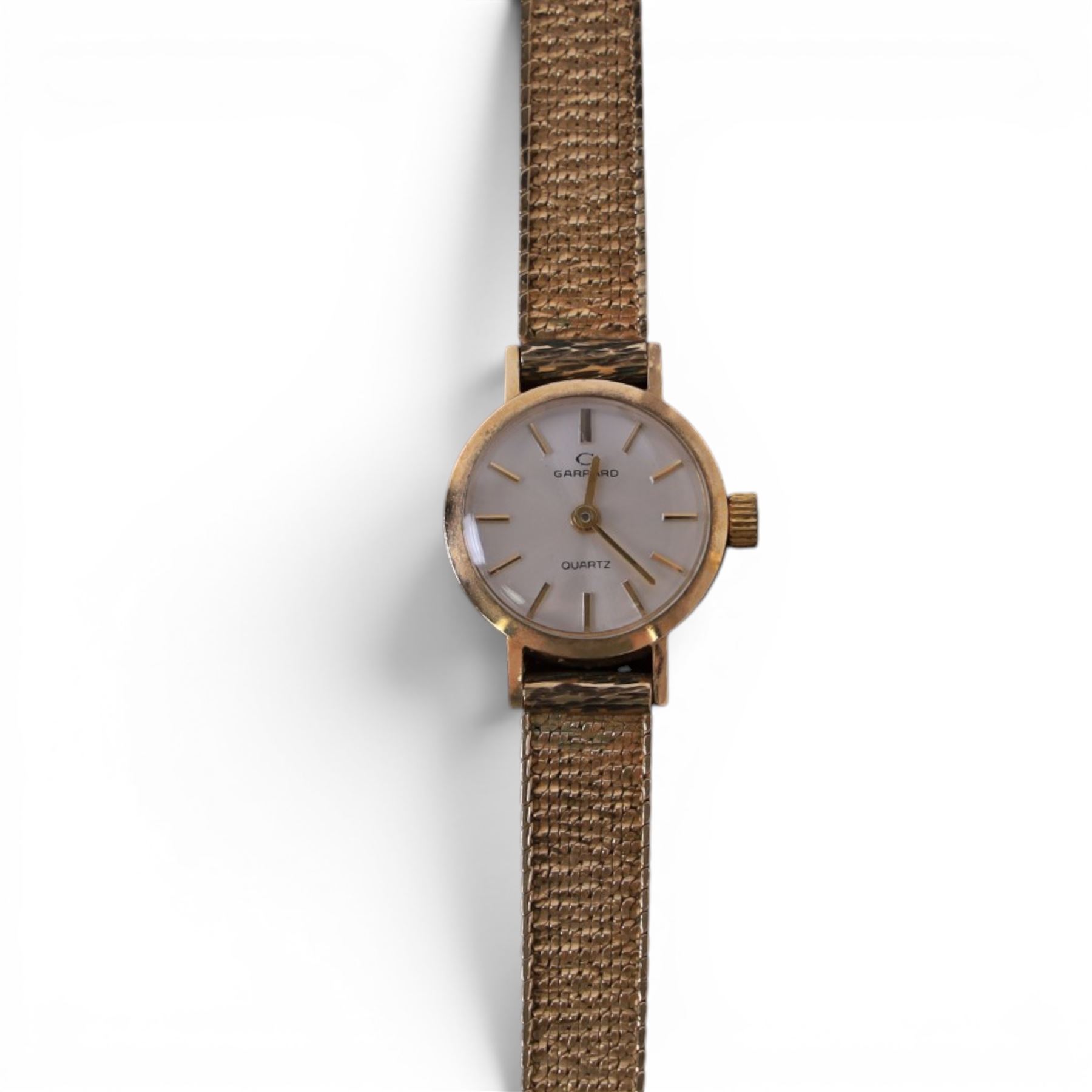 Garrard ladies 9ct gold quartz presentation wristwatch, on integral 9ct gold bracelet, hallmarked