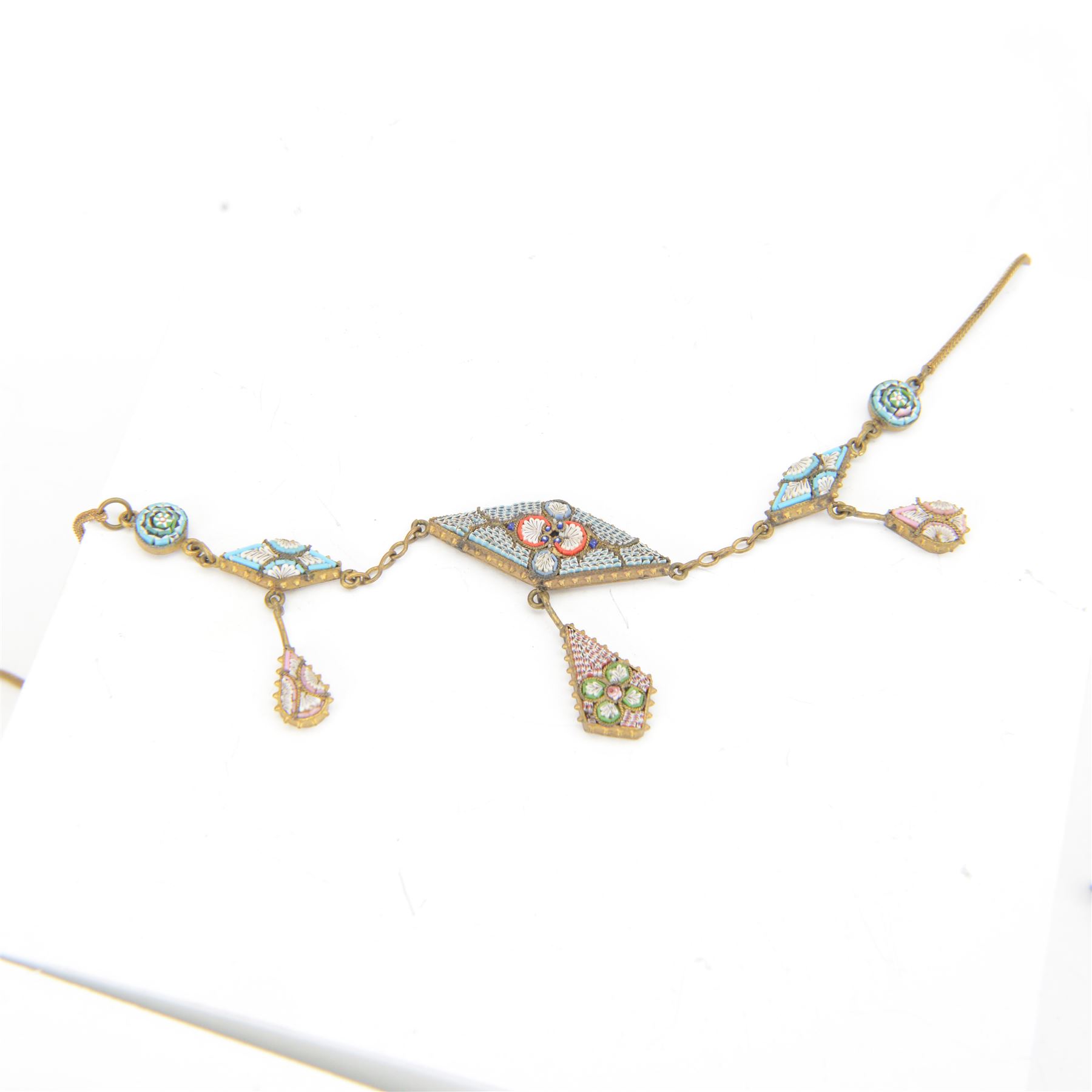 Two micro mosaic fringe necklaces, together with five pendent necklaces, all decorated with mosaic floral designs