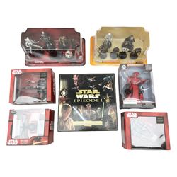 Star Wars - Disney Store The Force Awakens figurine playset, Poe's X-Wing Fighter, Snowspeeder and First Order Tie Fighter; Solo figurine set; The Last Jedi Elite Series die-cast action figure of Praetorian Guard; all mint and boxed; together with Star Wars Episode 1 card game, boxed (7)