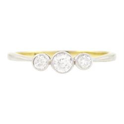 Early 20th century gold three stone diamond ring, milgrain set with graduating old cut dia...
