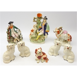  19th century Staffordshire figure of a Huntsman with Dog, flatback group 'Dog Tray', two pairs Staffordshire Spaniels, another single Spaniel and Girl Seated on Spaniel, H33cm max (8) Provenance: From a Private Yorkshire Collector  