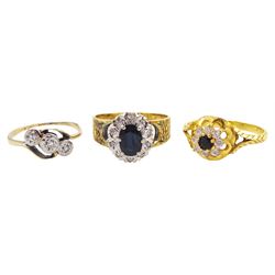 18ct gold sapphire and diamond cluster ring, 22ct gold sapphire and cubic zirconia cluster ring and a 9ct gold three stone diamond ring