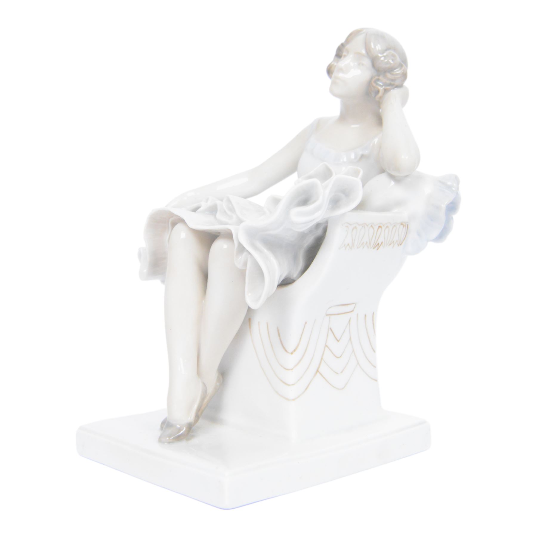 Royal Copenhagen figure no. 894, Woman Seated in a Chair, designed by Axel Locher, H20cm