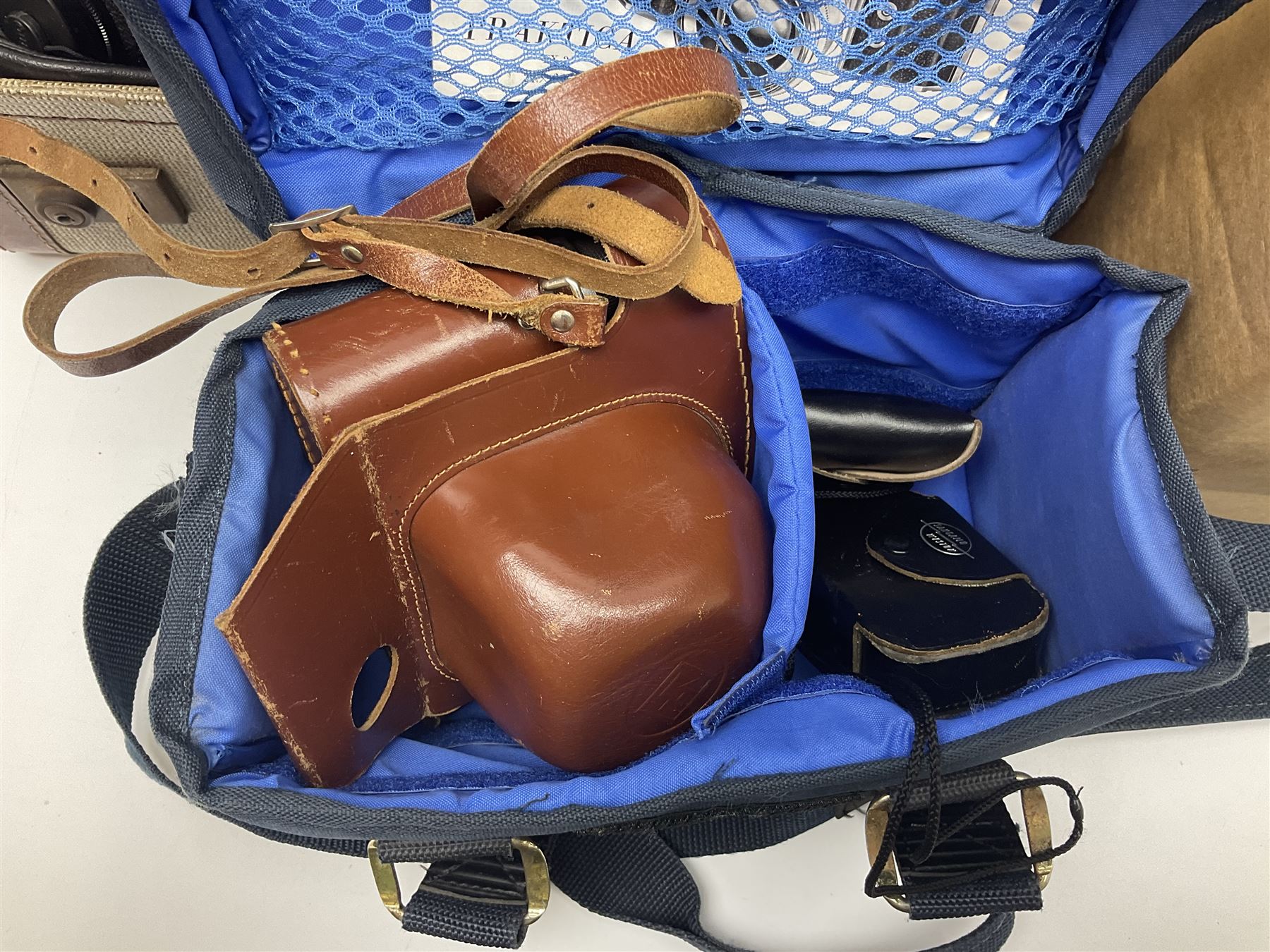 Quantity of cameras, to include Rollei 35 LED compact film camera, Praktica, Polaroid, etc