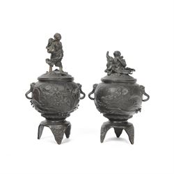 Pair of Japanese bronze koro, raised upon three feet, he body of the koro decorated with f...