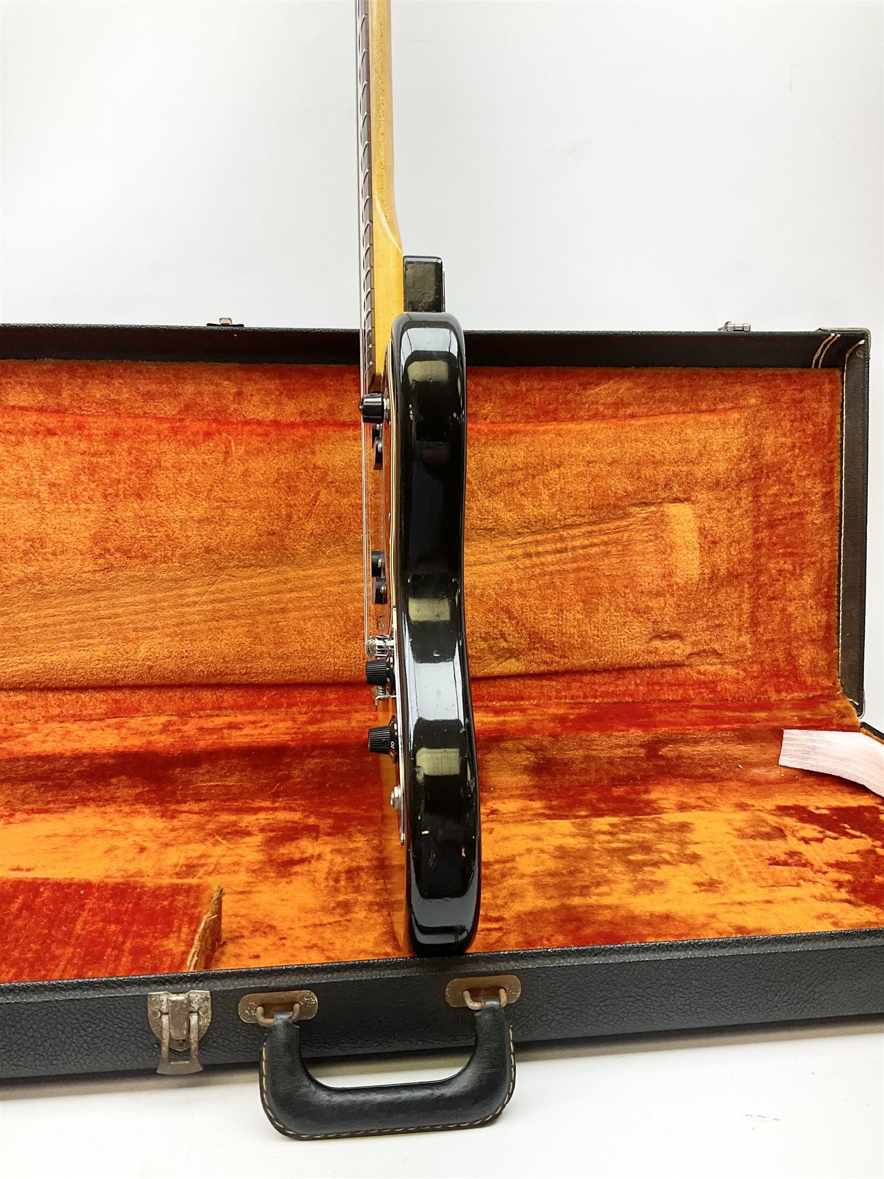 Fender three-tone Sunburst 12-string electric guitar c1965/6 Fullerton USA, with alder body and maple neck, the Indian rosewood fretboard with twenty-one frets and pearloid dot markers, fender electric XII bridge, F-stamp tuners (non-original), two split single coil pick-ups, master volume and tone and four-way switch, serial no.129730, L108cm; in original Fender case bearing label for Rivington Guitars New York with copy of original invoice; together with GuitarKes set-up and service certificate dated October 2021
