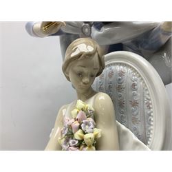 Lladro figure, Jester Serenade, modelled as a ballerina with bouquet of flowers seated before a jester playing the violin, limited edition 2541/3000, sculpted by Antonio Ramos, no 5932, with original box, year issued 1993, year retired 1994, H37cm