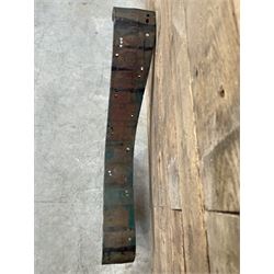 Early 20th century heavy cast iron three piece bench ends, decorated with scrolls and floral swags