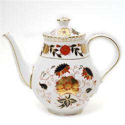 Royal Crown Derby 'Asian Rose' pattern A.962 tea service, comprising tea and coffee pots, open sucrier, milk jug, eight cups and saucers, six side plates, two serving plates, and a boxed Duck with gold stopper