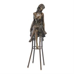Art Deco style bronze modelled as a semi naked female figure, seated upon a chair, signed ...