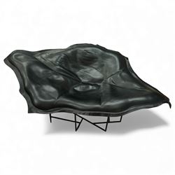 Poliform - ‘Wallace’ armchair, sculptural leaf-form silhouette upholstered in black leathe...