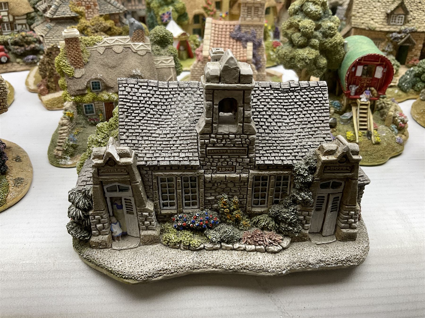 Twenty six Lilliput Lane models, to include Golden Harvest, Junk and Disorderley, Heaven Lea Cottage, Old Scrumpy Farm, Chantry Chapel Wakefield, etc, together with four similar cottages
