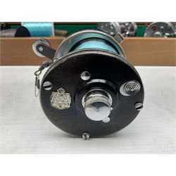 Four Abu fishing reels, comprising Ambassadeur 9000, Ambassadeur 7000, Ambassadeur 5500 and Ambassadeur 6500, together with additional line, hardy fishing bag and two wooden boxes