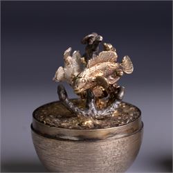 Stuart Devlin - Late 20th century silver and silver-gilt surprise egg, the textured gilt exterior opening to reveal an underwater scene with two fish and an anchor, hallmarked Stuart Devlin, London 1977, boxed, H10cm