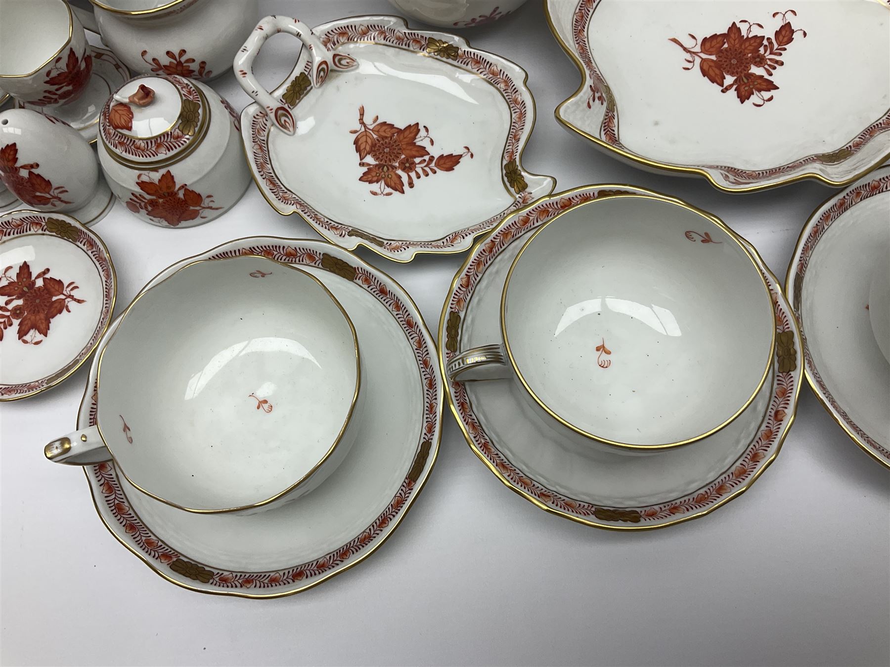 Herend Chinese Bouquet Rose pattern tea service comprising teapot, coffee pot, open sucrier, six cups and saucers, six tea plates, cream jug and stand, milk jug, two teabag holders, preserve pot, two leaf shaped dishes, four egg cups, salt & pepper pots, pair side plates and another plate