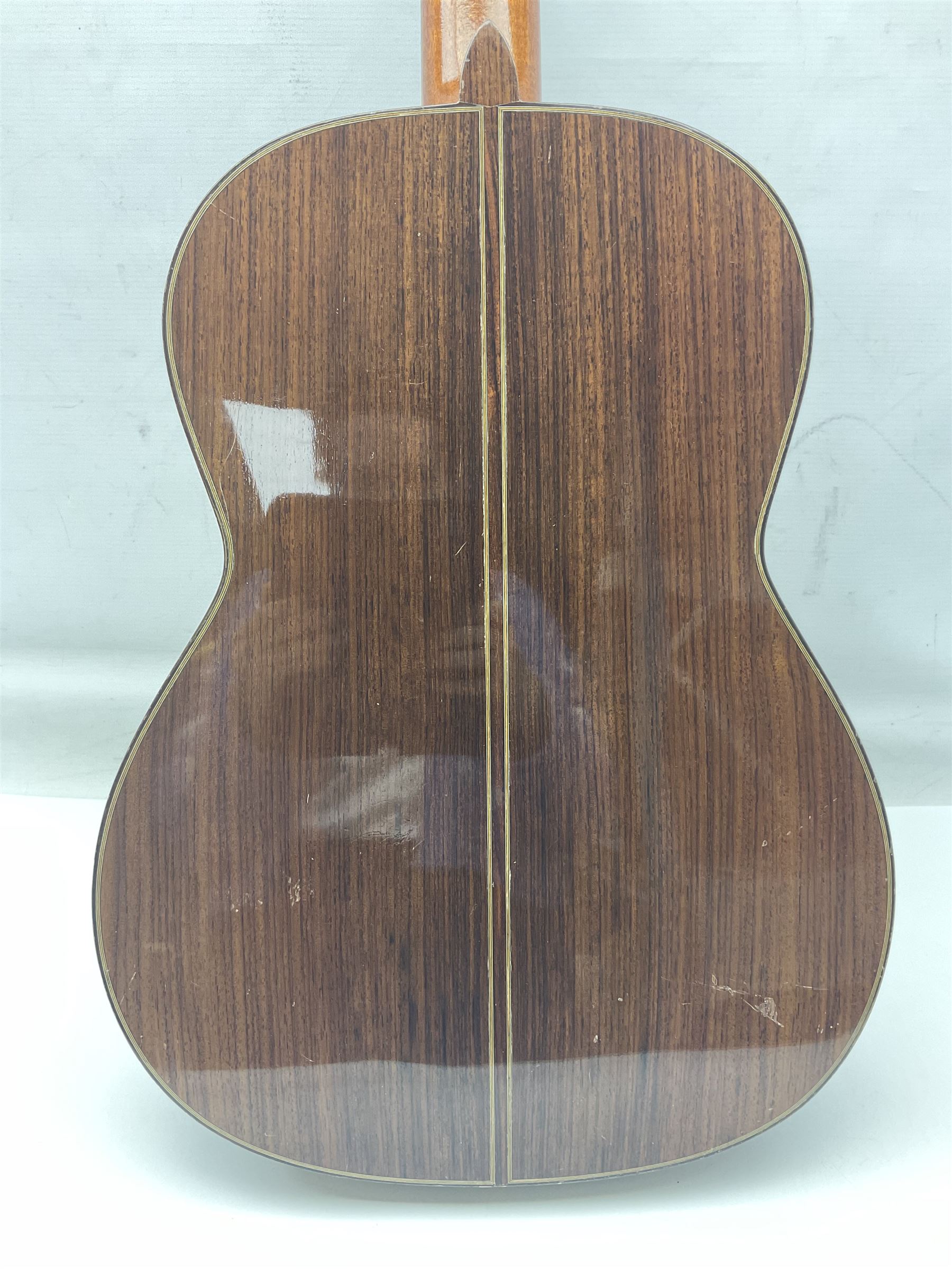 British hand made classical acoustic guitar by Huw Morgan with Indian rosewood back and sides and spruce top; bears label dated May 1998; L100cm; in Tribal Planet lightweight carrying case