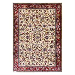 West Persian Sarough hand-knotted rug, ivory field decorated with finely drawn symmetrical...