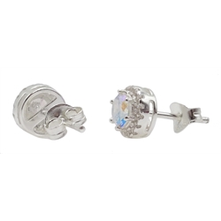  Pair of opal silver stud earrings and a pair of silver cubic zirconia cluster ear-rings  