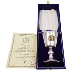 Modern limited edition silver goblet, commemorating Queen Elizabeth II silver jubilee, of plain form with gilded interior, applied Royal coat of arms to body and engraved 'The Queen's Silver Jubilee 1952-1977' upon knopped stem and circular spreading foot, limited edition no. 320/1000, hallmarked A T Cannon Ltd, Sheffield 1977, boxed with certificate, goblet H12.8cm