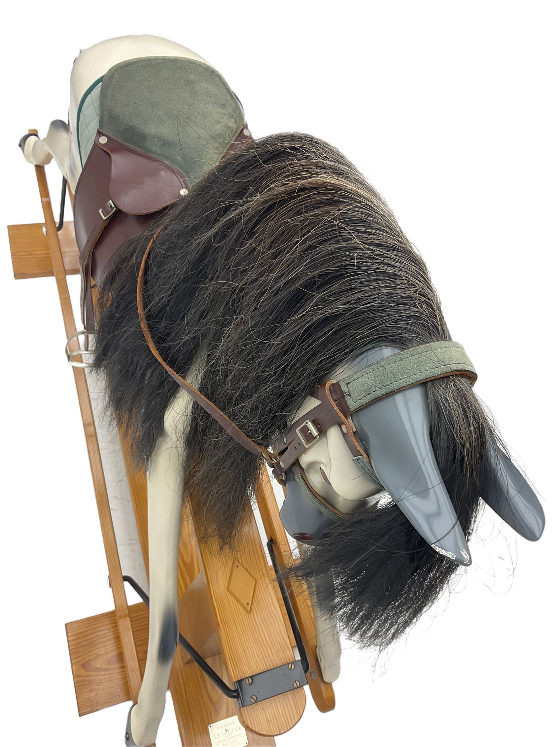 Haddon rocking horse, with tack, on pine trestle base