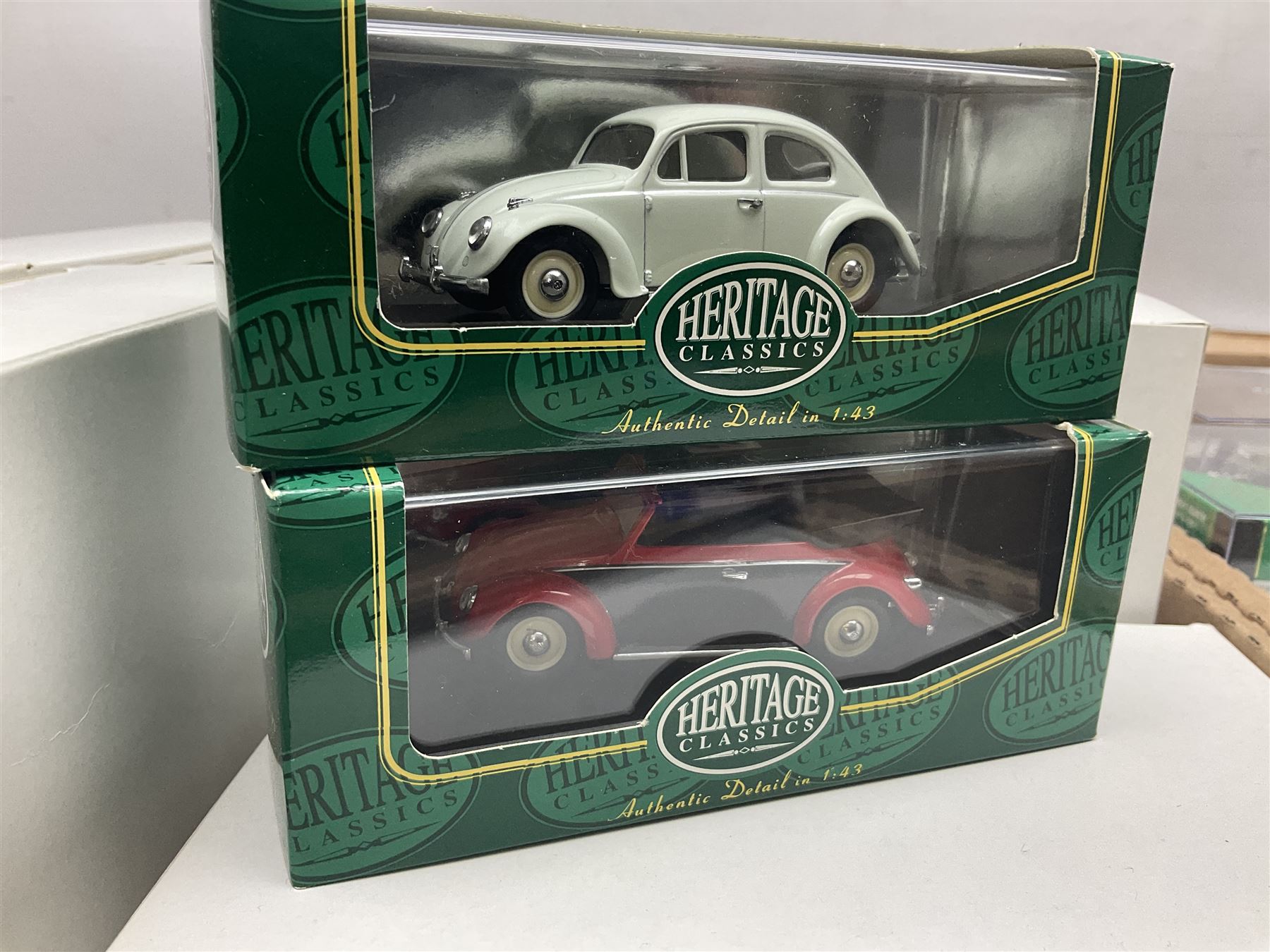 Heritage - thirty-five die-cast model racing cars comprising twenty-five Heritage Formula 1 1:43 scale models including Ferrari, Lotus, Yamaha etc; and ten Special Edition models including Williams Renault Ayrton Senna, David Coulthard and IndyCar, etc with certificates; and a Heritage Classics Damon Hill helmet; all in display boxes, many with original packaging (36)