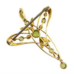 Edwardian Art Nouveau gold peridot and seed pearl pendant/brooch, stamped 9ct, boxed