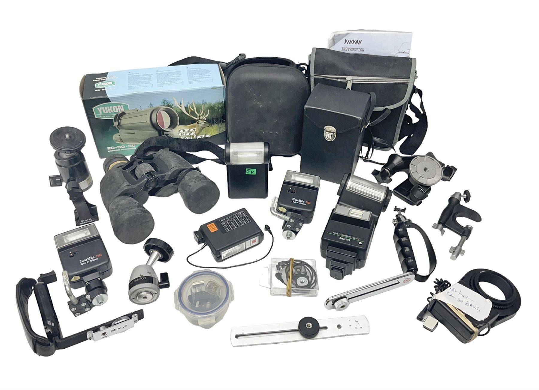 Yukon rubber armoured compact variable power spotting scope (boxed), together with Bresser 10x50 binoculars, Bushnell Excursion 10x42 binoculars, camera equipment etc  