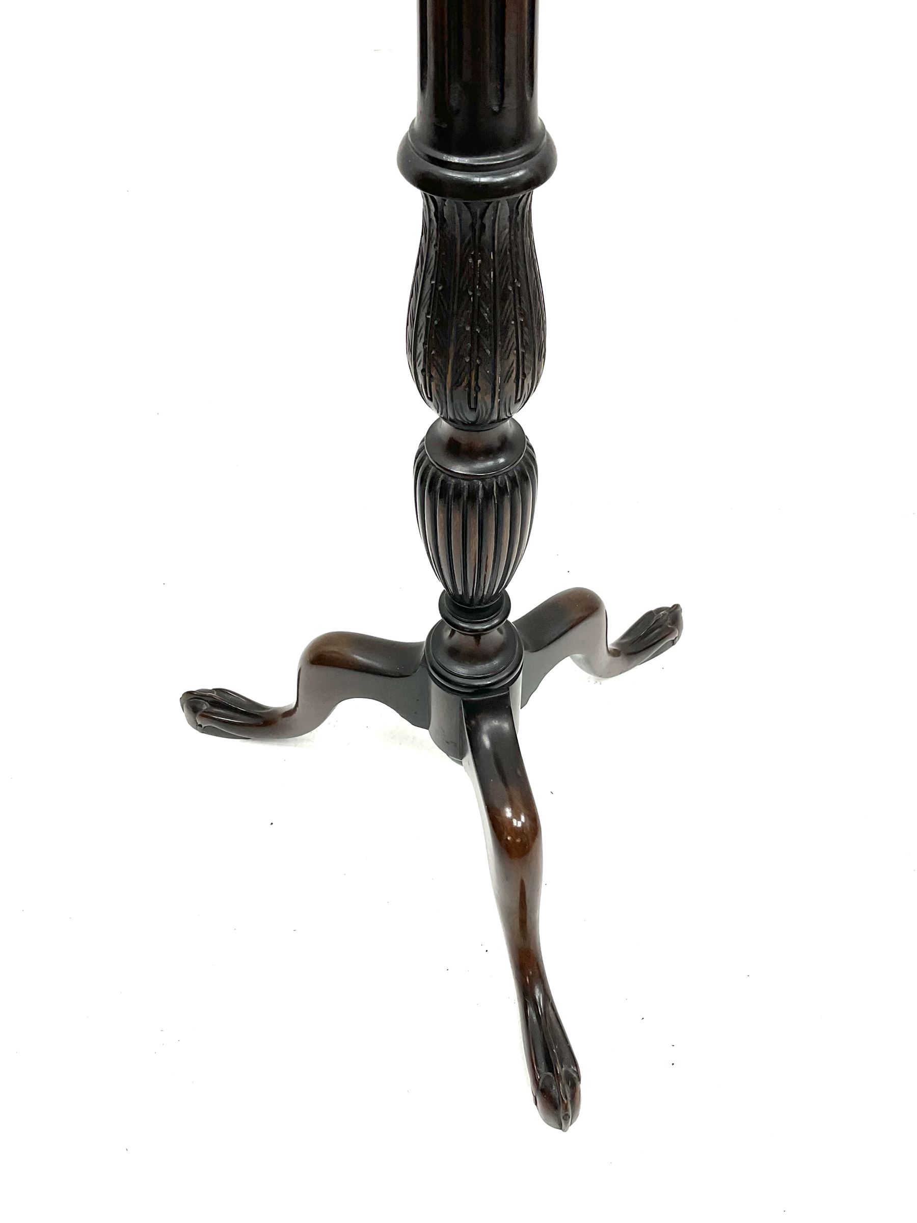 Early 20th century mahogany plant stand, carved central column, raised on three cabriole supports 