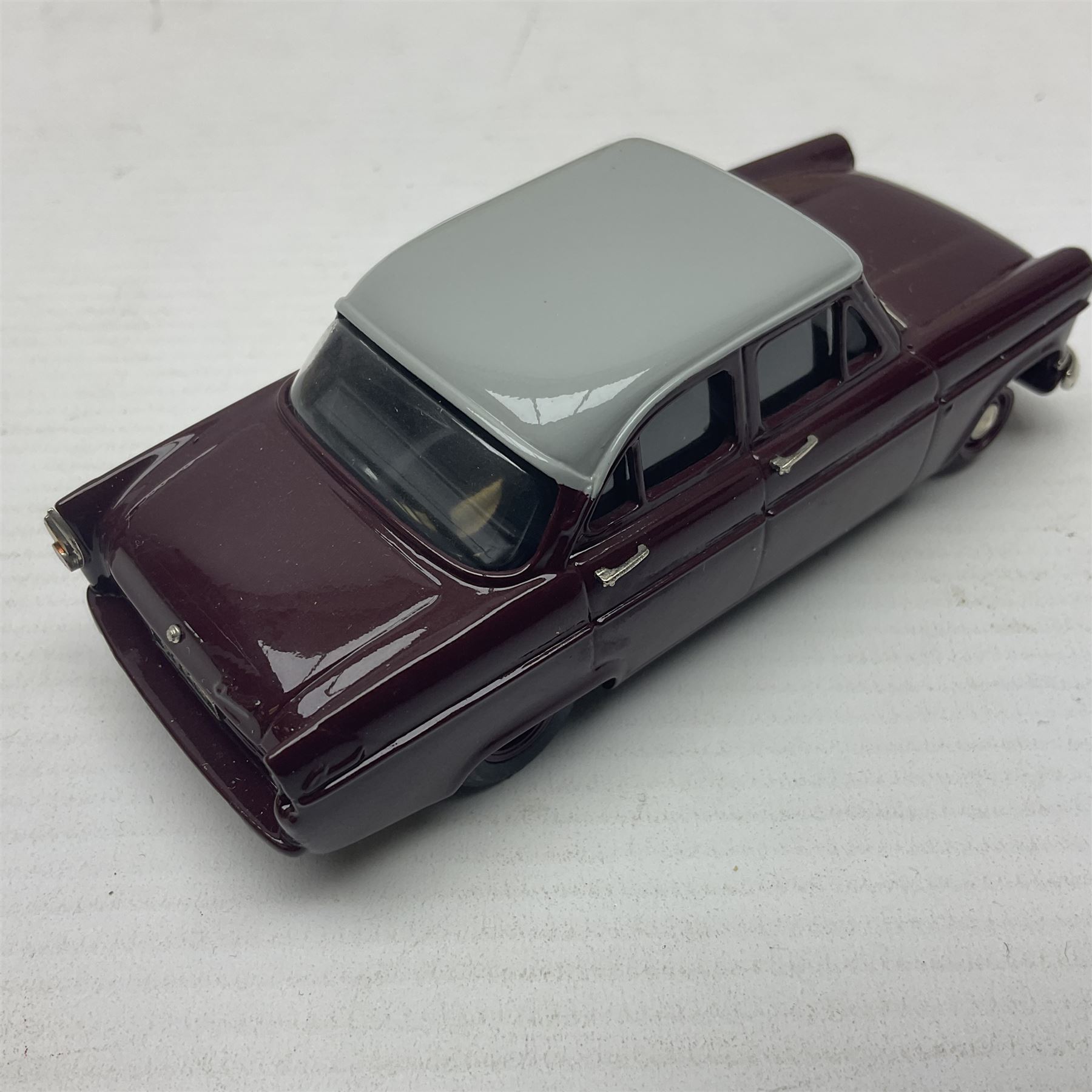 Four Lansdowne Models 1:43 scale models - 1956 Hillman minx Series 1 (Pearl grey over Fiesta blue); 1957 Hillman Husky Series 1 (Seacrest green/foam grey); 1960 Ford Consul MkII (Imperial maroon/smoke grey); and 1972 Vauxhall Ventora 3300 MkII; all boxed (4)