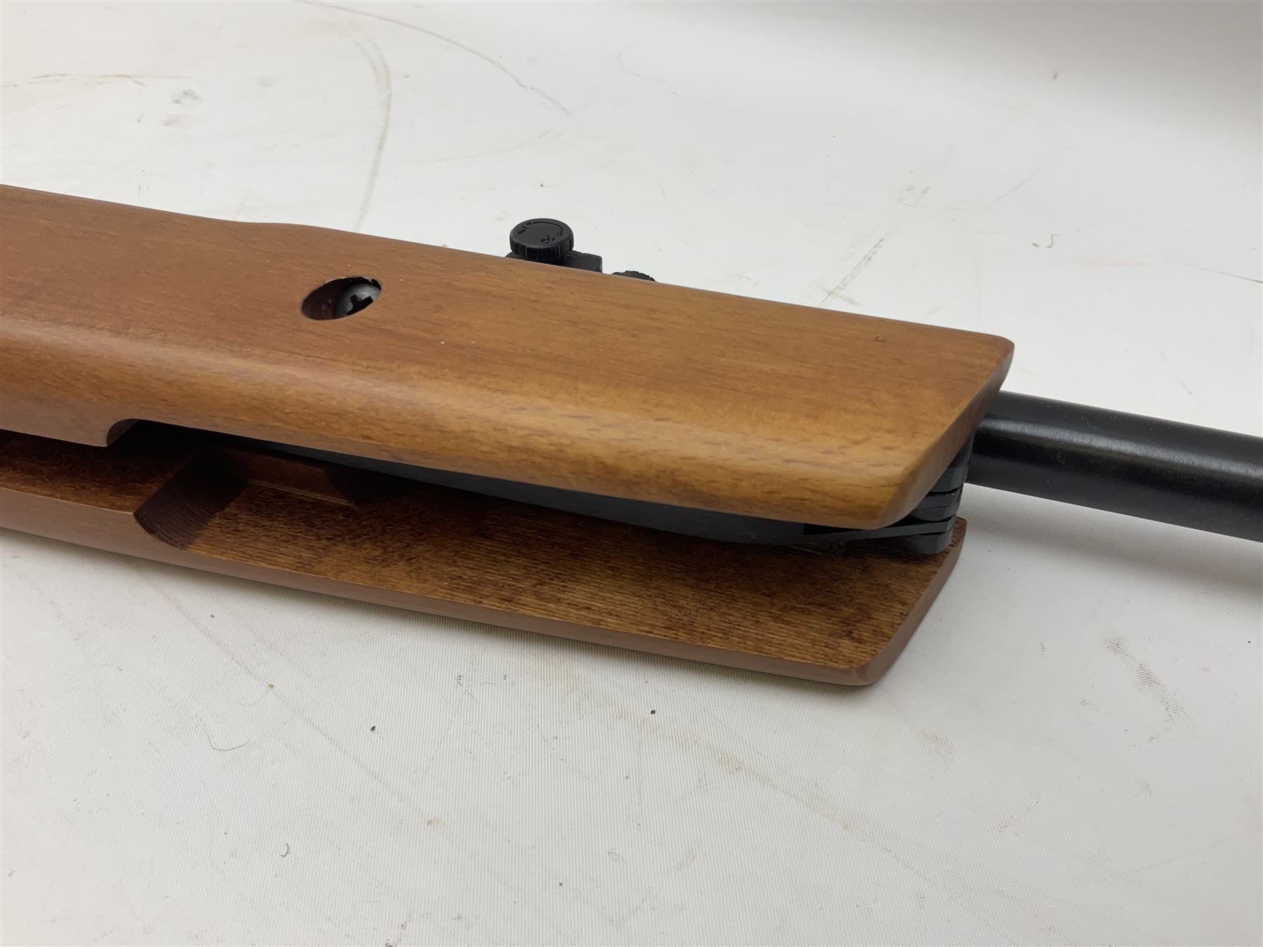 Hatsan .22 break-action air rifle retailed by Edgar brothers with 46cm barrel including fully integrated sound moderator, No.092031501; L113cm overall; in gun sleeve; together with Hawke Vantage 2-7x32 telescopic sight, Bressler Condor 24-72x100 spotting scope with carrying case and Velbon EF-61 tripod; all boxed (4)