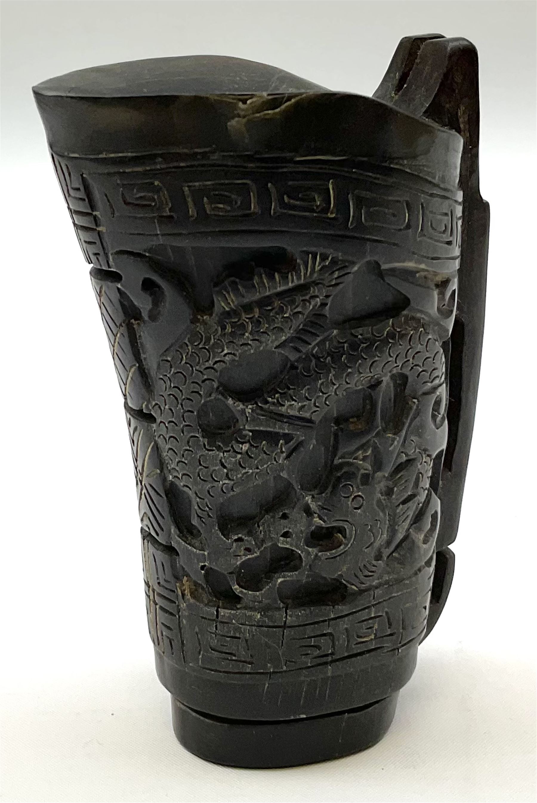 Chinese horn blood collection cup, carved with dragons and key fret border, H9.5cm