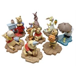 Collection of eight Disney Pooh and Friends figures, comprising Hip, hip Poohray for birthdays, Tricks and treats for someone sweet, We'll share forever whatever the weather, Thanks for being a Caring Sort of Bear, Now it's perfect just like you, Have a red-shirt red letter day, Life is sweet and I love you Mama, all with boxes