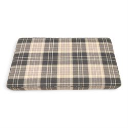 Large traditional design upholstered footstool, upholstered in checked fabric, with loose cushion, raised on a light turned supports 