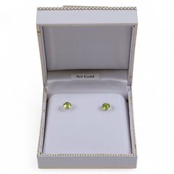 Pair of 9ct gold green stone stud earrings, boxed