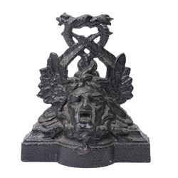 Victorian painted cast iron door porter, cast with a Medusa head and entwined serpents, H27cm