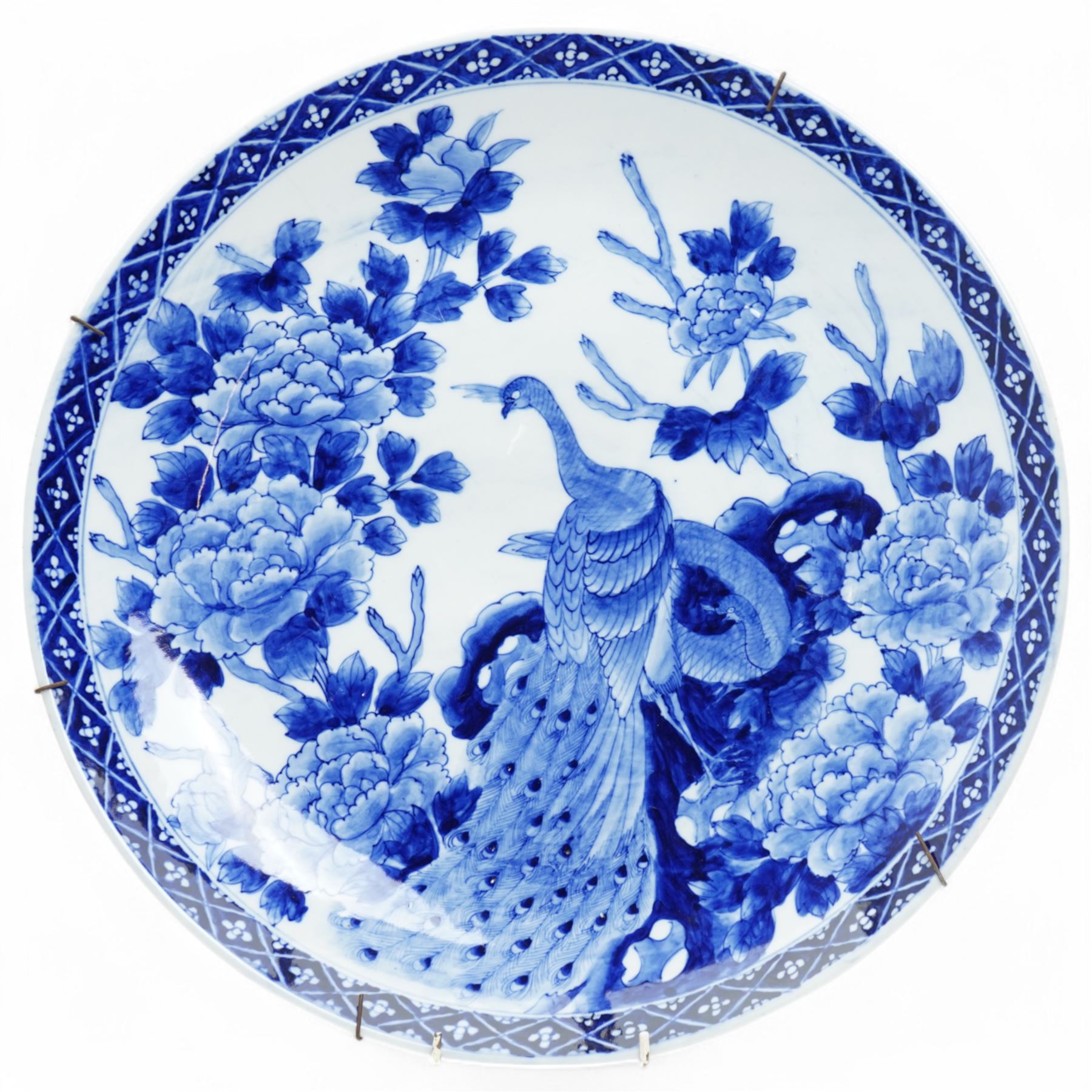 Japanese charger decorated in blue and white with peacock, flowers etc D46cm