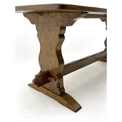 ‘Gnomeman’ oak dining table, rectangular adzed top, shaped end supports on sledge feet joined by pegged stretcher, carved with gnome signature, by Thomas Whittaker of Littlebeck