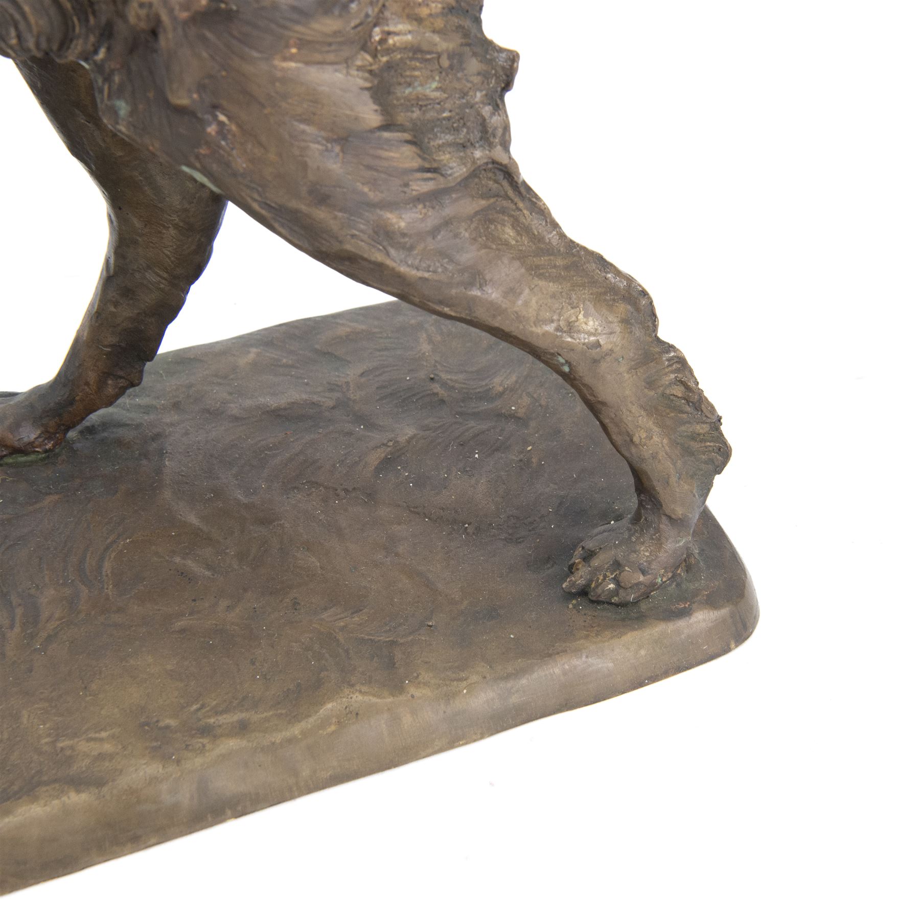 Bronze sculpture of a gundog retrieving a pheasant, finely cast with detailed coat and featherwork, mounted on a textured rectangular base