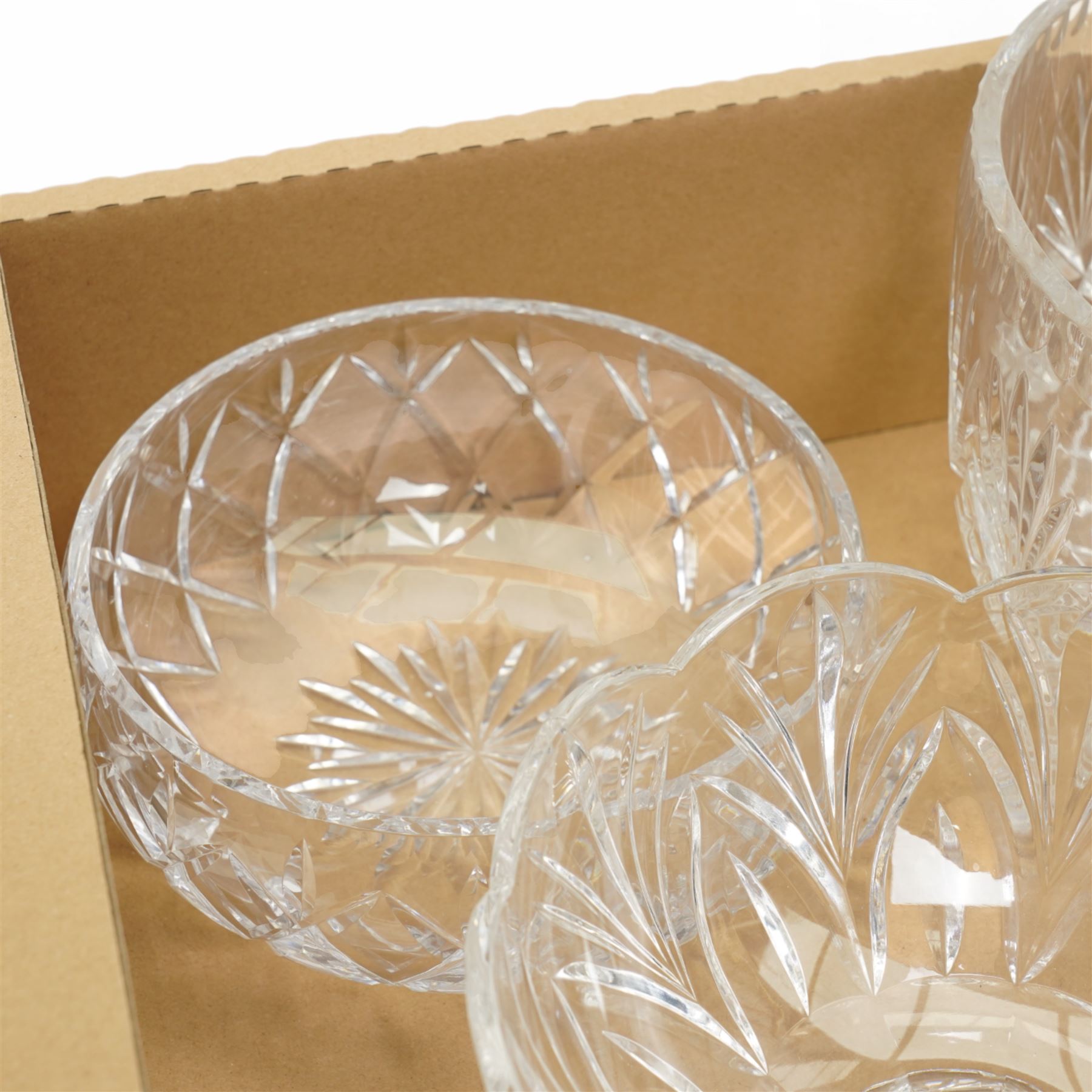 A Marquis by Waterford cut glass pedestal fruit bowl, decorated in the Canterbury pattern, together with two other crystal bowls, unmarked, largest H16.5cm (3)