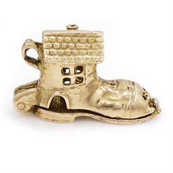 Two gold pendants / charms including 17ct guitar and a 9ct articulated lady in a shoe, London 1964