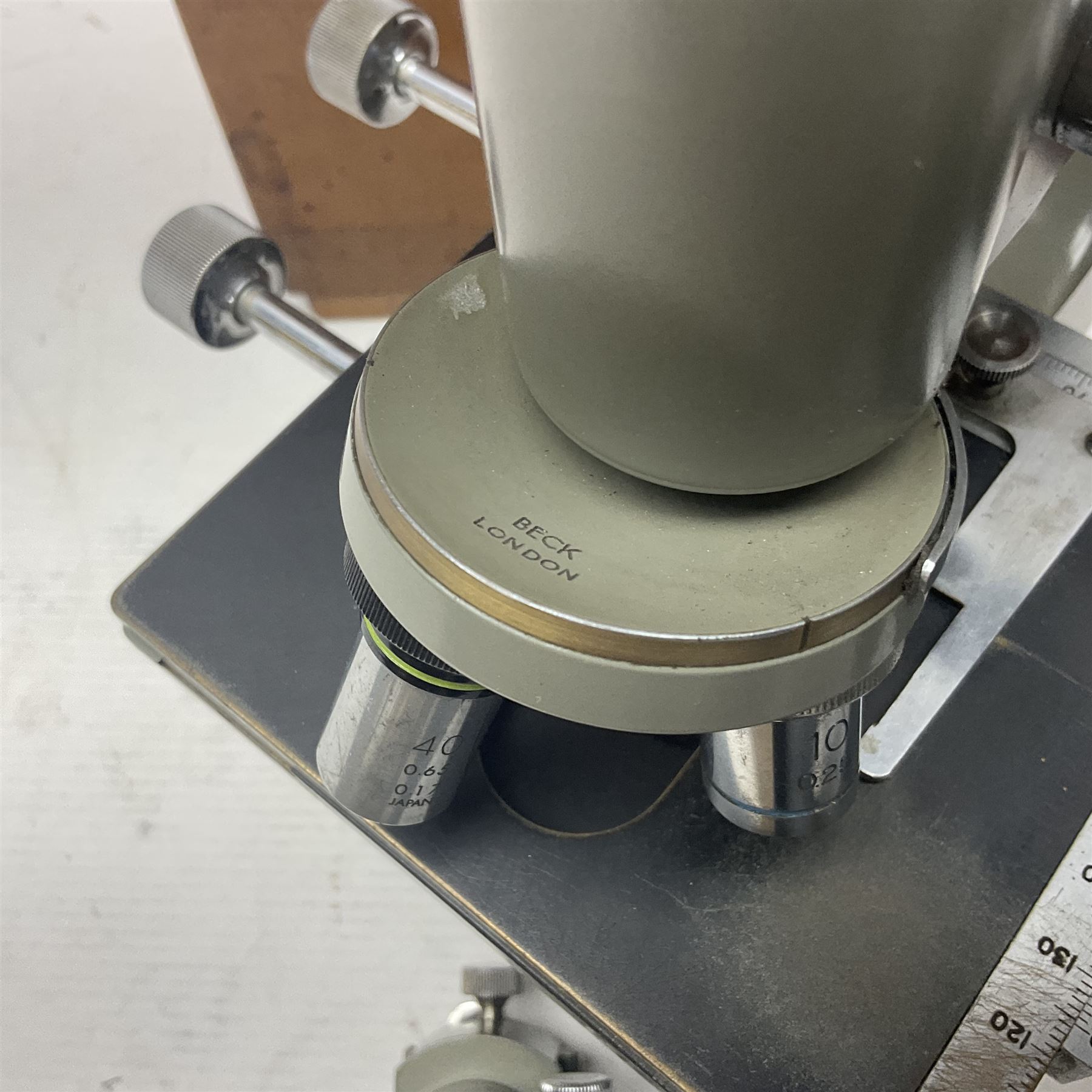 Four microscopes, including Cooke, Troughton & Simms no M467926, W Watson & Sons no 114758, W & J George & Beck Ltd no 36649 and one other 