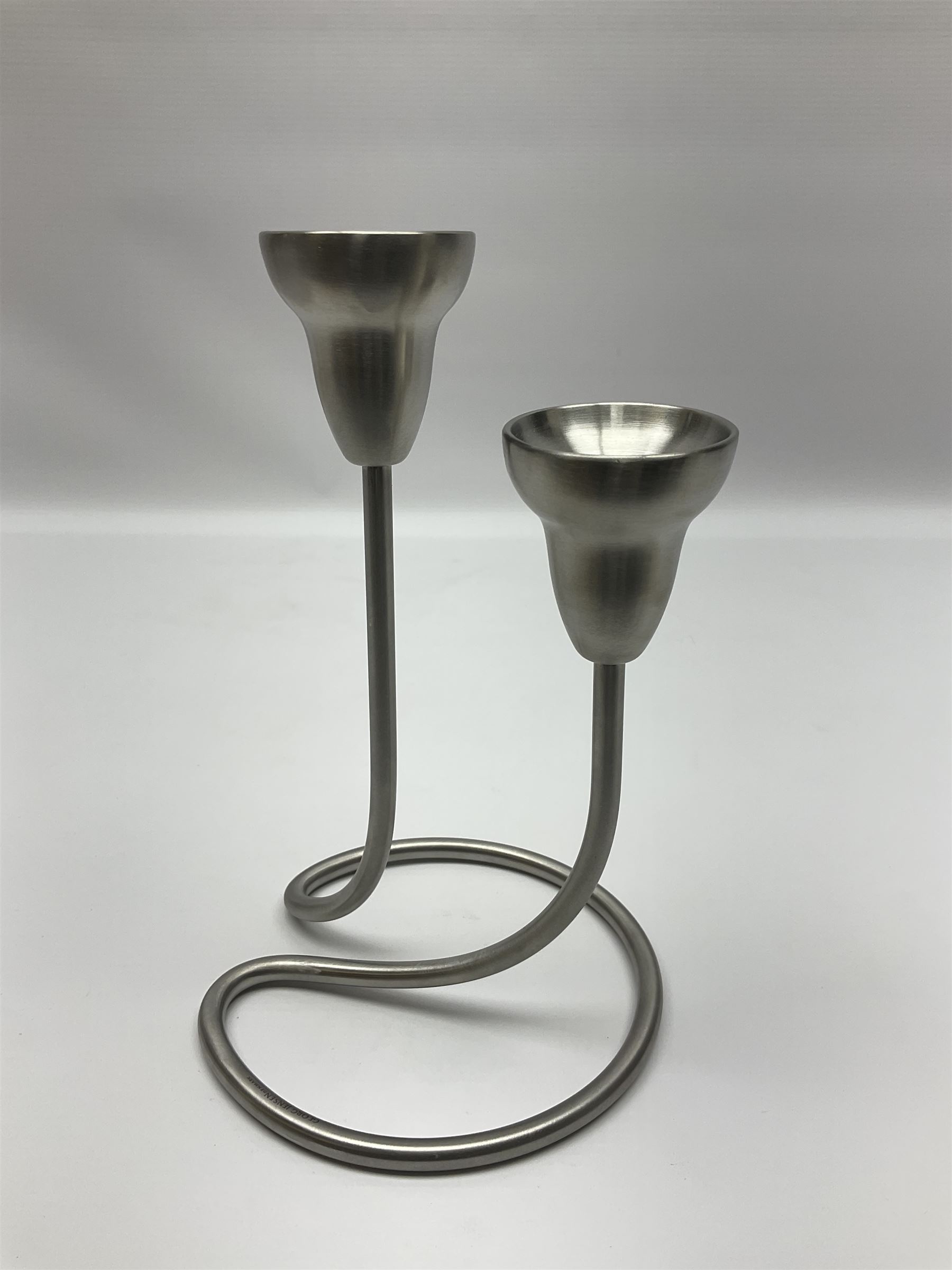 Georg Jensen two-branch swing candelabrum in matte stainless steel