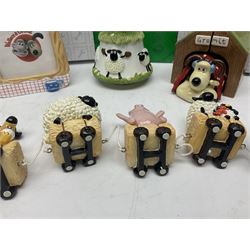 Border Fine Arts Shaun The Sheep Tractor Train and musical figure, together with a Wallace and Gromit photograph frame and a Gromit cruet sett, three in original boxes  