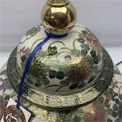 Table lamp of squat baluster form, decorated with Mandarin ducks and floral  landscape, upon a circular wooden base H42cm